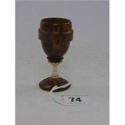 A TURNED TREEN DICE CUP, 19th Century, bone stem, circular foot, height 8cm...