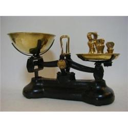 A SET OF FOOD SCALES, brass pans, maker Libra Scale Co, with five bell weights, 1lb descending (6...