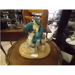 STATUE OF SAILOR ON DOCK