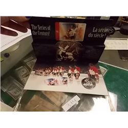 COMMEMORATIVE SILVER DOLLAR, PHONE CARD AND STAMP