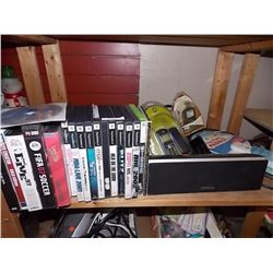 SHELF OF ELECTRONICS AND GAMES