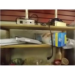 SHELF OF BATHROOM ITEMS