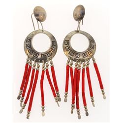 Coral dangling earring on silver