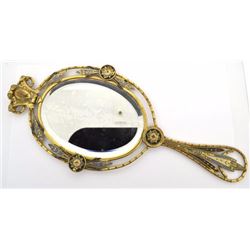 Vintage gold tone handle mirror with floral design