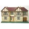 Image 1 : A Tri-ang mock Tudor doll's house, pre-war, double-fronted and opening in two sections, garage to...