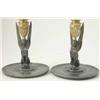 Image 1 : A pair of French late 19th century brass and silvered metal "sphinx" candlesticks, each seated on...
