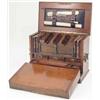 Image 1 : A late Victorian walnut stationery cabinet, the cover carved with sun flower petals, the front pa...