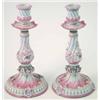Image 1 : A pair of German porcelain candlesticks moulded with leaves in rococo style and painted in pink a...