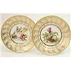 Image 1 : A pair of English porcelain dessert plates, circa 1800, the centres painted with a miscellany of...