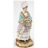 Image 1 : A Meissen figure of a lady, wearing elaborate head-dress, full-length floral-painted dress and wi...