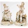 Image 1 : A pair of German porcelain figures, shepherd playing pipe, shepherdess seated beside lamb, some d...