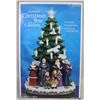 Image 1 : ILLUMINATED CHRISTMAS TREE WITH CAROLERS