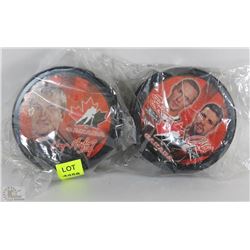 SET OF TWO TEAM CANADA COMMEMORATIVE HOCKEY PUCKS