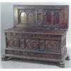Image 1 : A late 17th century/early 18th century Spanish oak coffer, the rising lid carved on the underside...