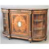 Image 1 : A mid Victorian figured walnut and ebonised credenza, the central door with oval green jasper cla...