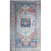 Image 1 : A North West Persian Heriz carpet, the pale terracotta field with a central ivory panel containin...