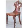 A Victorian mahogany hall chair, on turned legs...