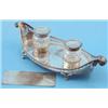 Image 1 : An Edwardian silver inkstand, of elliptical form with pierced gallery and two cut glass wells, 10...