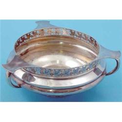 An Edwardian 3-handled silver rose bowl, with vineous pierced frieze, 1906 24oz...