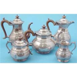 A George V 5-piece silver tea and coffee set of rounded and octagonal form, Makers Mappin & Webb...