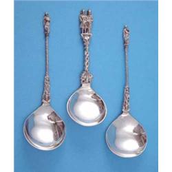 A pair of Dutch silver apostle spoons, and a marriage spoon....