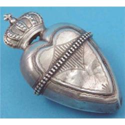 A Continental silver heart shaped pill box with crown finial. 2.75ins...