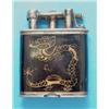 Image 1 : A Dunhill Unique silver petrol lighter decorated with a gilt dragon motif on a black ground, 2ins...