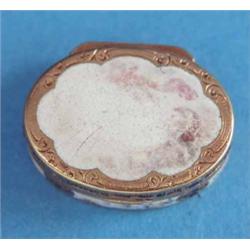 A George III enamelled gold vinaigrette, of oval form with worn enamelling and scroll pierced gri...