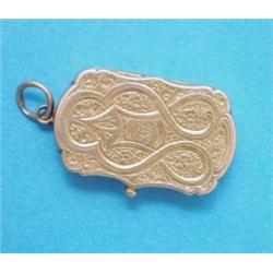 An early Victorian gold vinaigrette, of serpentine rectangular form with scroll engraving and fol...
