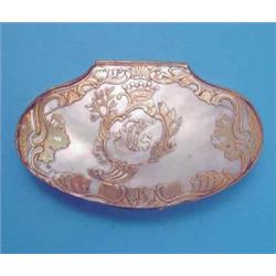 An early 19th century Continental parcel gilt mother of pearl snuff box, cartouche shaped, with r...