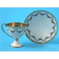 A Continental 930 standard cup and saucer, with enamelled decoration, stamped M. Hammer...