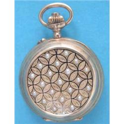 A Swiss 18ct gold keyless fob watch, with split pearl applied, black enamelled case...