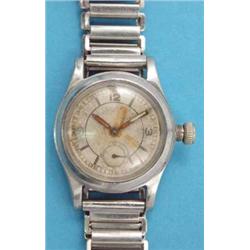 A gentlemans steel Oyster Watch Co wrist watch, with silvered arabic dial and subsidiary seconds....