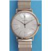 Image 1 : A gentlemans gold Movado wrist watch, with circular case and baton numerals....