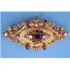 Image 1 : A Victorian designed textured gold lozenge shape openwork brooch set diamonds and garnets....