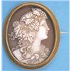 Image 1 : A Victorian shell cameo brooch carved with a study of a bacchante, in gold rope twist frame, 1.5i...