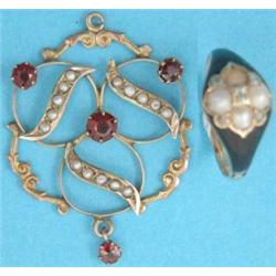 An Edwardian gold openwork circular pendant set seed pearls and garnets, together with a Victoria...