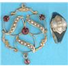 Image 1 : An Edwardian gold openwork circular pendant set seed pearls and garnets, together with a Victoria...