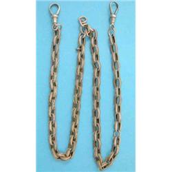 A gold watch chain of plain and star embossed links, 19.5grms....