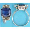 Image 1 : A gold ring claw-set with a Ceylon sapphire, the cornflower blue cushion shape stone approx. 5cts...