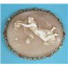 Image 1 : A Victorian shell cameo brooch carved with a muse, in scroll work frame set turquoises, 2.25ins....
