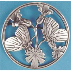A Georg Jensen silver circular brooch depicting butterflies and flowerheads, pattern no: 283, 2in...