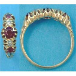 An 18ct gold claw-set 5-stone ruby and diamond half hoop ring, with scroll carved shoulders...