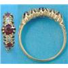 Image 1 : An 18ct gold claw-set 5-stone ruby and diamond half hoop ring, with scroll carved shoulders...