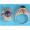 Image 1 : A gold bombe shape dress ring set with a central cabochon sapphire and round cut diamonds and rub...
