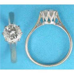 A solitaire diamond ring, the brilliant cut stone claw set in 18ct. white gold, approx. 1ct....