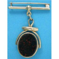 A late Victorian 9ct. gold bloodstone and agate oval fob seal, on later gold bar brooch....
