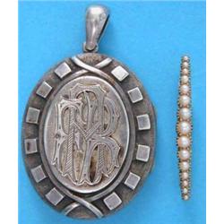 A Victorian silver pendant locket with monogram, together with a gold bar brooch set with a line...