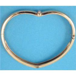 A Piaget 18ct. gold heart shape hinged love bangle set 3 diamonds (cased)....