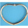 Image 1 : A Piaget 18ct. gold heart shape hinged love bangle set 3 diamonds (cased)....